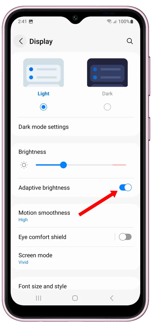 Toggle the switch next to Adaptive brightness on your Galaxy F14